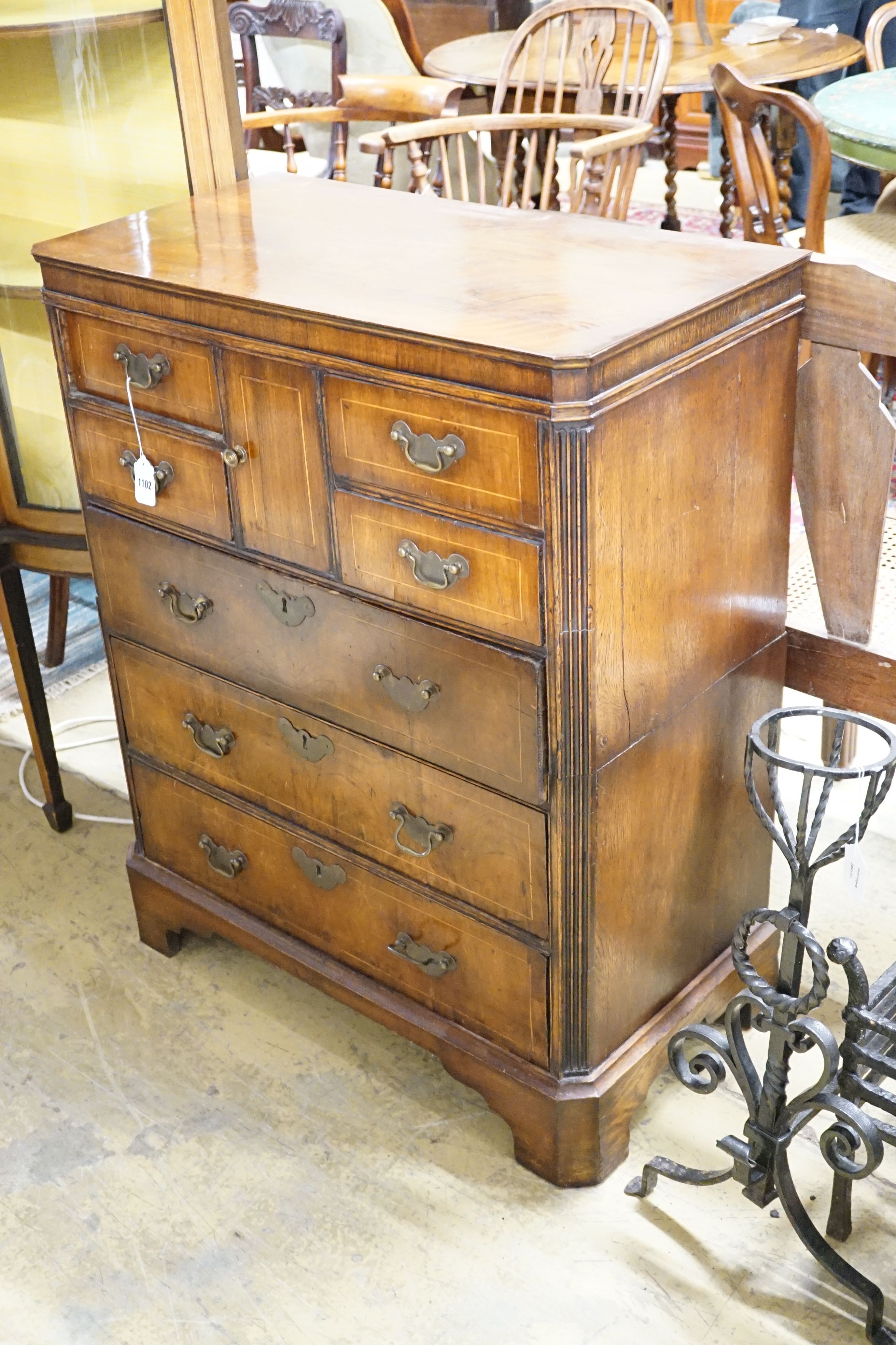 A George II and later walnut, oak and boxwood strung chest of eight drawers, 79 cm wide, 41.5 cm deep, 99 cm high